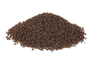 Black tea granules on a white background