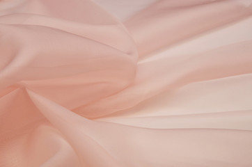 Silk fabric, organza is light pink.