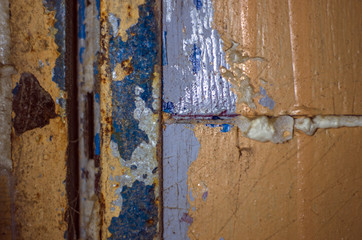 multi-colored paint on uneven surface