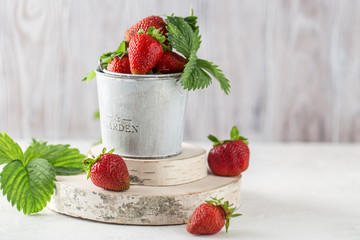 Fresh juicy strawberries with leaves. Strawberry background. Healthy food concept. Fresh organic berries