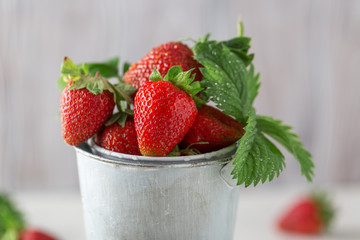 Fresh juicy strawberries with leaves. Strawberry background. Healthy food concept. Fresh organic berries
