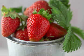 Fresh juicy strawberries with leaves. Strawberry background. Healthy food concept. Fresh organic berries