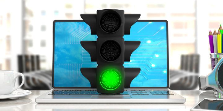 Green light. Traffic light, green go signal, on a computer, office background. 3d illustration