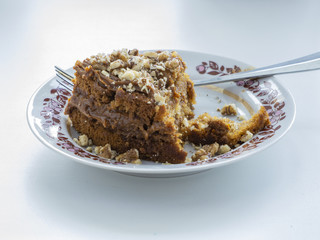 cake with walnuts on a plate