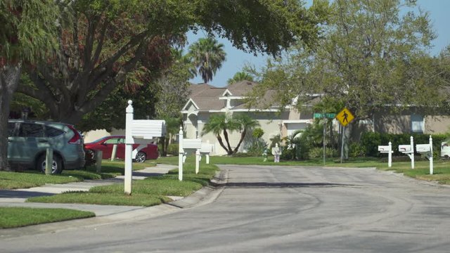 White US mailbox with in a suburban neighborhood - Florida, United States