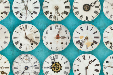 Pattern of different antique weathered clocks