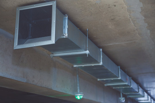 Fire exhauster in a multi-level parking building