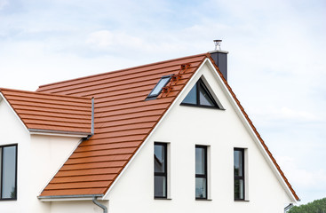 facade and roof of a new house - bright and clean