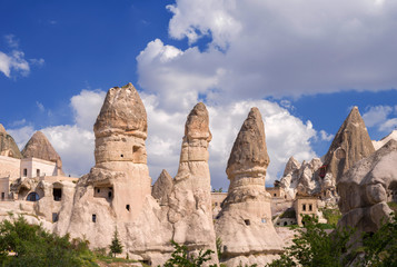 Housing and hotels arranged in sandstone formations in Goreme. Cappadocia, Turkey.