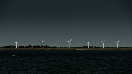 Fototapeta na wymiar Modern windmills in the Netherlands