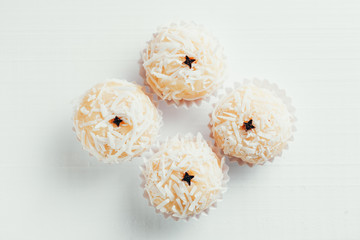 Beijinho is a handmade candy from Brazil. Made with condensed milk and coconut. Children brithday party sweet.