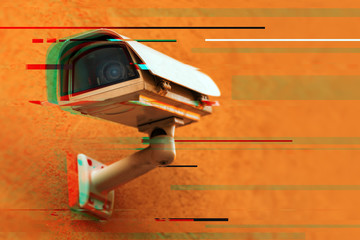 Close up of security camera with digital glitch effect