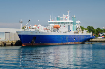 Cable Ship in Harbour on a Clear Summer Day