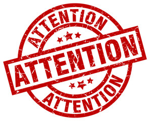 attention round red grunge stamp