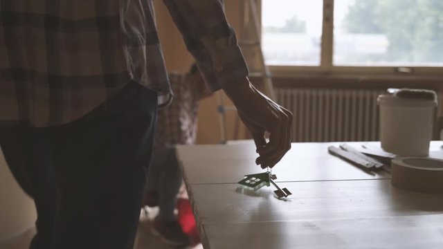 Young couple moving in their new house and doing a home makeover