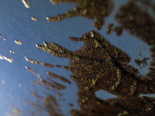multi-colored paint on uneven surface