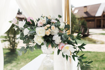 Beautiful wedding ceremony outdoors. Square wedding arch