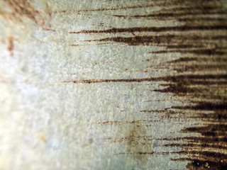 multi-colored paint on uneven surface