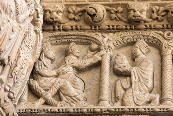 Fototapeta na wymiar Details of the west portal Saint Trophime Cathedral in Arles, France. Bouches-du-Rhone, France