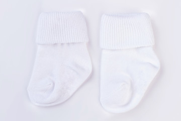 White baby wool socks isolated on white.