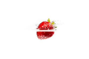A fresh and delicious red strawberry isolated on a white background. Red strawberry dropping in water and creating a splash. The concept of healthy eating, consuming fruit.