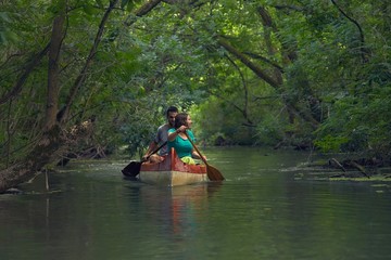 Fototapeta na wymiar Canoe tour on a river