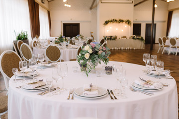 Festive lunch at restaurant. A wedding table for guests.