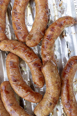 Pork sausages on grill