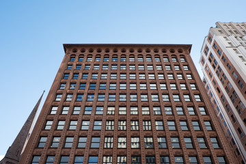 Looking up at the Guaranty Building (Prudential Building) designed by Louis Sullivan in 1896 following Form Follows Function design theory. Clad in terracotta in Buffalo New York.