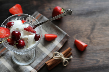 Yoghurt with fresh strawberries and cherries