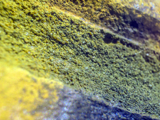 multi-colored paint on uneven surface