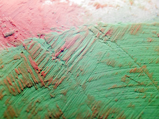 multi-colored paint on uneven surface