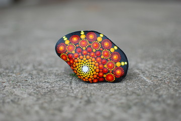 Red and Yellow Dot Psychedelic painted mandala stone