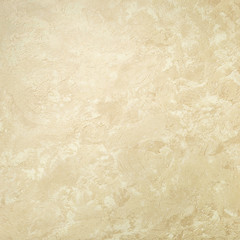 Textured background. Decorative plaster walls, external decoration of facade. Texture of beige