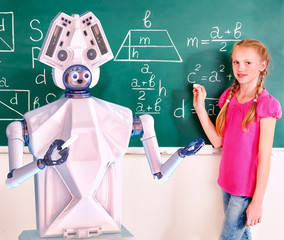Teacher robot with schoolchild girl in school class next to blackboard. Interactive ai online...