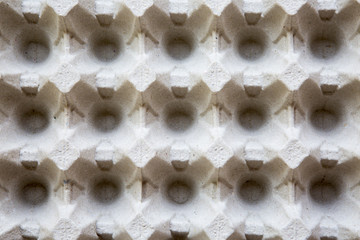 Empty egg box, top view. From above. Close-up.