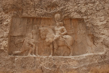 Relief of Shapur I over the Romens carved in the rock in Naqsh-e Rustam, Iran