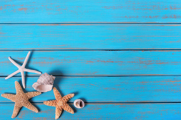 Summer beach seashore background starfish blue old wood paint peeling