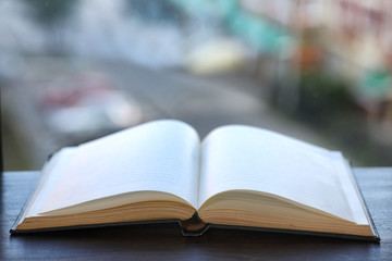 open book and a table