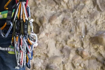 Foto op Aluminium rock climbing carabiners on belt  © pureradiancecmp
