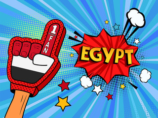 Male hand in the country flag glove of a sports fan raised up celebrating win and Egypt speech bubble with stars and clouds. Colorful illustration in retro comic style