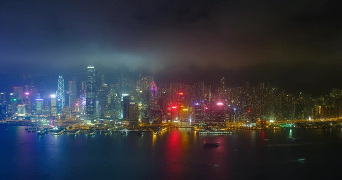 Aerial timelapse of illuminated Hong Kong skyline. Hong Kong, China