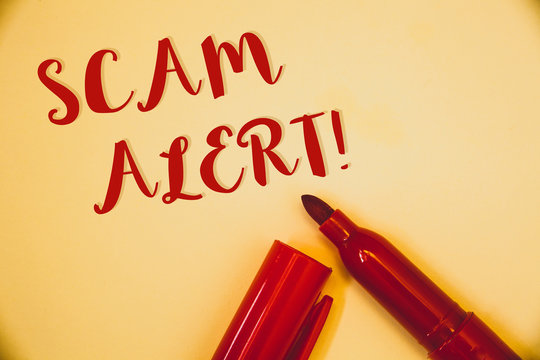 Handwriting Text Scam Alert Motivational Call. Concept Meaning Safety Warning To Avoid Fraud Or Virus AttacksIdeas Messages Words Red Letters Created On Vintage Background Open Pen.