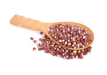 cow peas in wooden spoon on white background