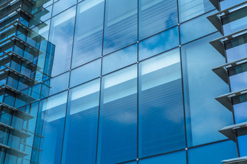 Urban abstract - windowed corner of office building.