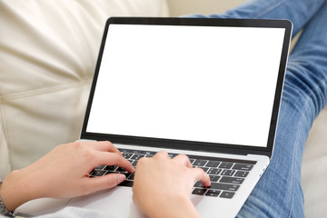 Woman using laptop computer with blank screen for mock up template background, technology and lifestyle, working at home background concept