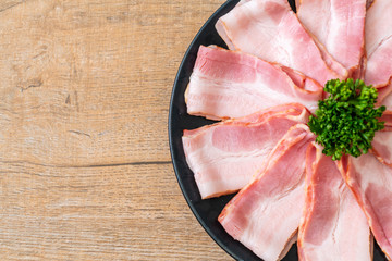 sliced raw pork bacon