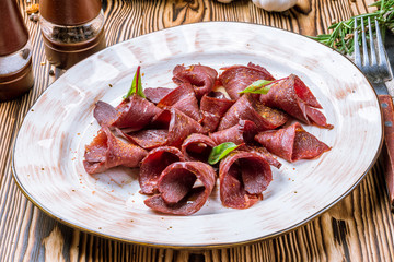 sliced dry-cured venison
