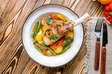 Leg of lamb baked with vegetables