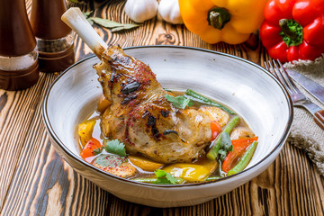 Leg of lamb baked with vegetables